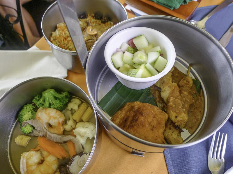 Traditional meal aboard the North Borneo Railway