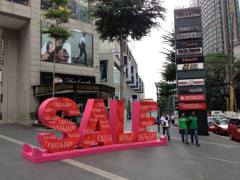 things to do in KL: shop! A giant Sale sign in front of a mall