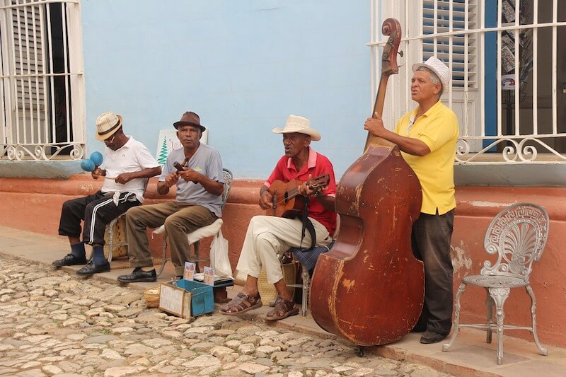 Salsa musicians on a Trinidad street, typical of Cuba travel