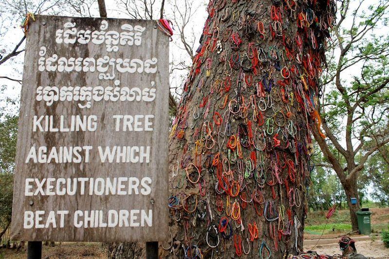 Dark tourism - the tree against which babies were murdered during the Pol Pot regime in Cambodia