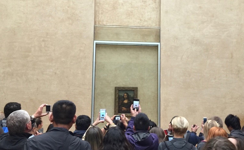 the negative side of tourism - approaching the Mona Lisa at the Louvre