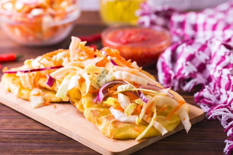 Garnished pupusas in El Salvador
